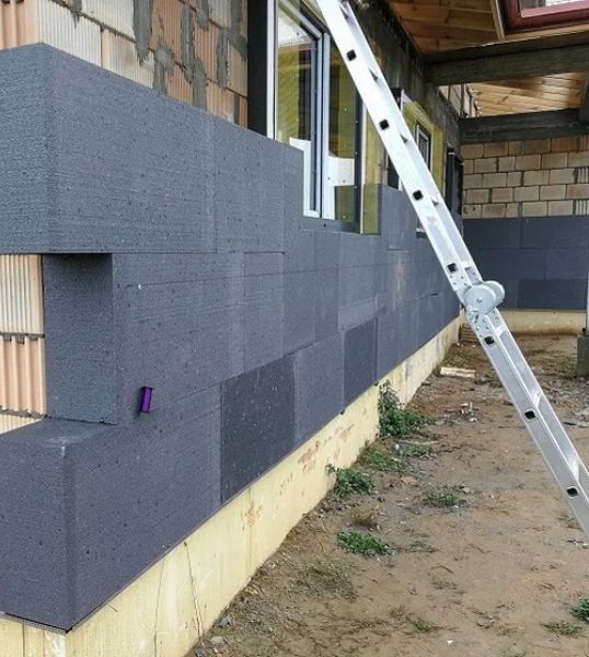 External wall insulation being installed on a home